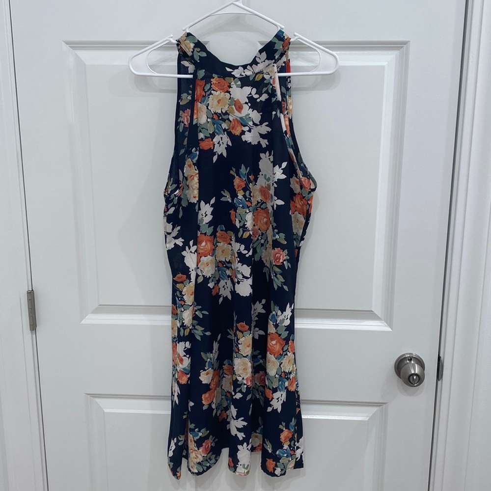 Navy blue high neck dress with floral pattern. Size large.